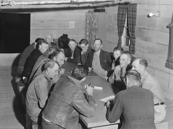 Meeting of the camp council, FSA camp, Farmersville, California, 1939. Creator: Dorothea Lange.