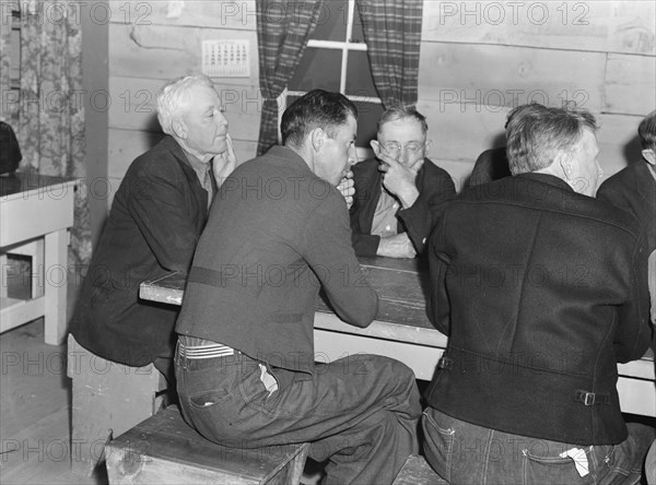 Meeting of the camp council, FSA camp, Farmersville, California, 1939. Creator: Dorothea Lange.