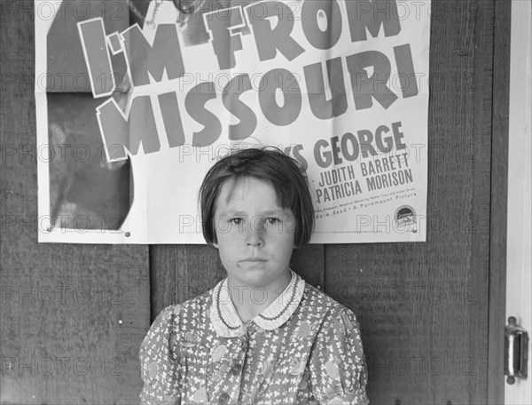 Advertisement for current movie in town, Westley, California, 1939. Creator: Dorothea Lange.