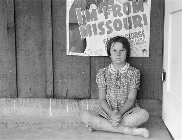 Advertisement for current movie in town, Westley, California, 1939. Creator: Dorothea Lange.