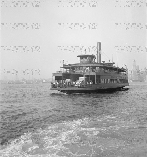 Ferry boats still transport some of the traffic between New York City and Jersey, 1939. Creator: Dorothea Lange.
