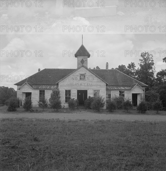 Hickory Mount grange holds its meeting in an old school..., Chatham County, North Carolina, 1939. Creator: Dorothea Lange.