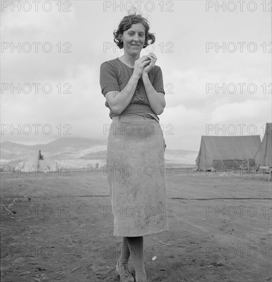 Young migrant mother has just finished washing, Merrill FSA camp, Klamath County, Oregon, 1939. Creator: Dorothea Lange.