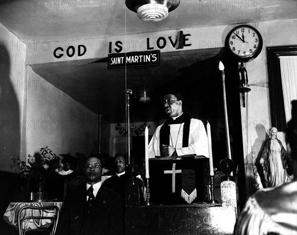 Reverend Vondell Gassaway, pastor of the St. Martin's Spiritual Church..., Washington, D.C., 1942. Creator: Gordon Parks.