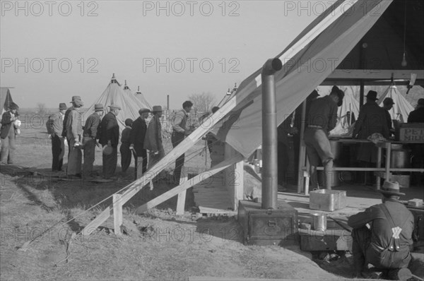 Possibly: The kitchen in the camp for white flood refugees at Forrest City, Arkansas, 1937. Creator: Walker Evans.