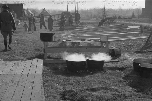 Possibly: The kitchen in the camp for white flood refugees at Forrest City, Arkansas, 1937. Creator: Walker Evans.