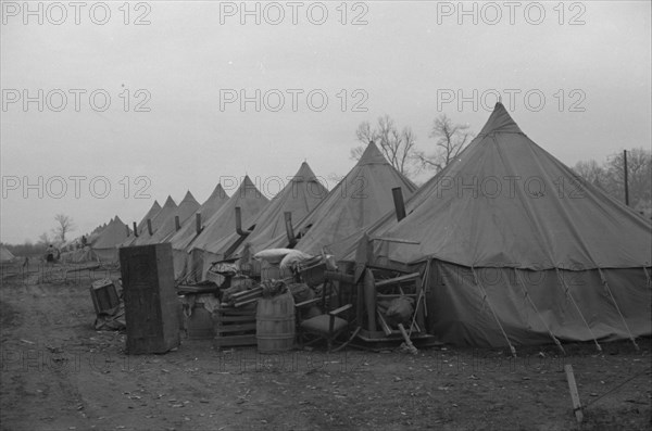 Possibly: The kitchen in the camp for white flood refugees at Forrest City, Arkansas, 1937. Creator: Walker Evans.