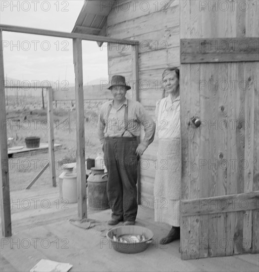 New settler shows fish he caught..., Priest River Valley, Bonner County, Idaho, 1939. Creator: Dorothea Lange.