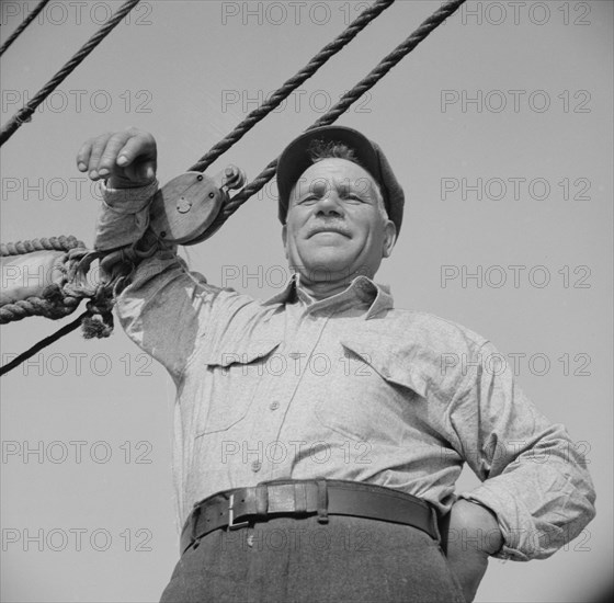 On board the fishing boat Alden out of Gloucester, Massachusetts, 1943. Creator: Gordon Parks.