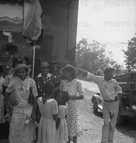 Possibly: Chatham County farmers in town on Saturday afternoon, Pittsboro, North Carolina, 1939. Creator: Dorothea Lange.