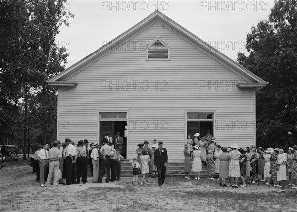 Congregation gathers in groups...Wheeley's Church, Person County, North Carolina, 1939. Creator: Dorothea Lange.