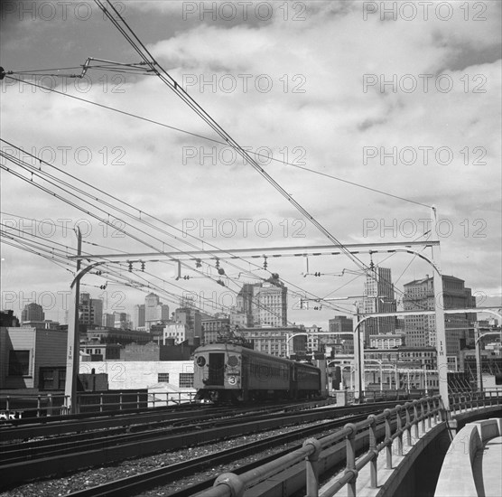 The city of San Francisco, California, seen from the first street ramp of Oakland Bay Bridge, 1939. Creator: Dorothea Lange.