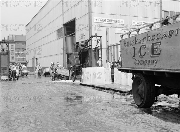 Ice which is used to store fish on boats that bring their catches into Fulton..., New York, 1943. Creator: Gordon Parks.