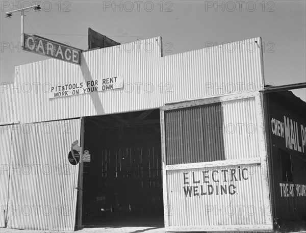 Pit and tools for rent--work on your own, U.S. 99, Fresno County, California, 1939. Creator: Dorothea Lange.