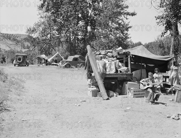 Possibly: Camp of migratory families in "Ramblers Park", Yakima Valley, Washington, 1939. Creator: Dorothea Lange.