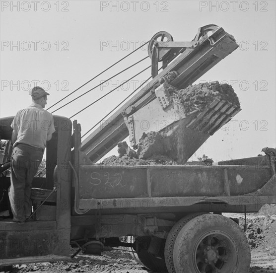 Preparing the ground for the construction of emergency buildings..., Washington, D.C, 1942. Creator: Gordon Parks.