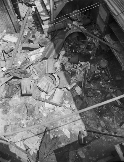 Interiors of wrecked homes on Independence Avenue..., Washington, D.C, 1942. Creator: Gordon Parks.