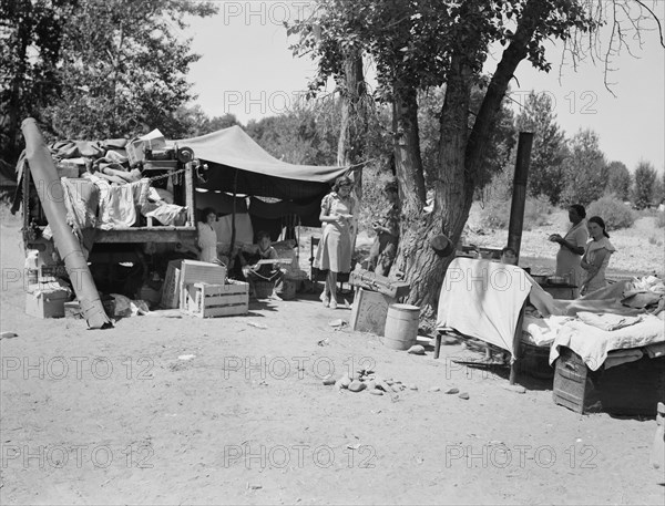 Camp of family with nine children who have been on the road..., Yakima Valley, Washington, 1939. Creator: Dorothea Lange.