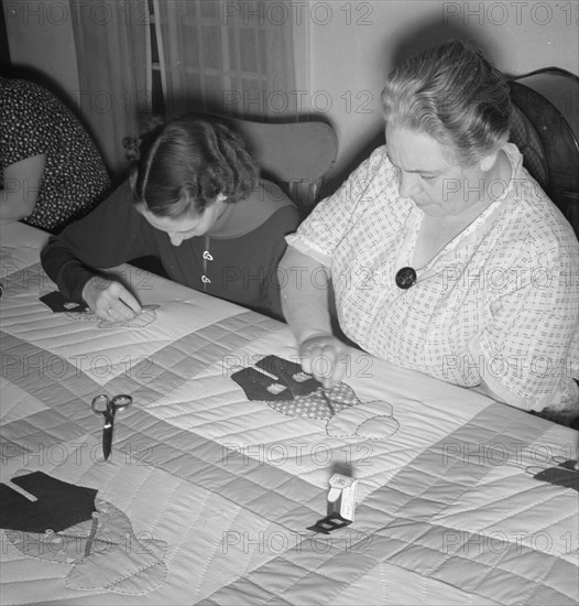 Farm women working on quilt, near West Carlton, Yamhill County, Oregon, 1939. Creator: Dorothea Lange.