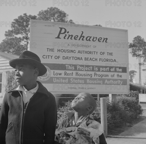 Two children living in low rent housing project near Bethune-Cookman...Daytona Beach, Florida, 1943. Creator: Gordon Parks.