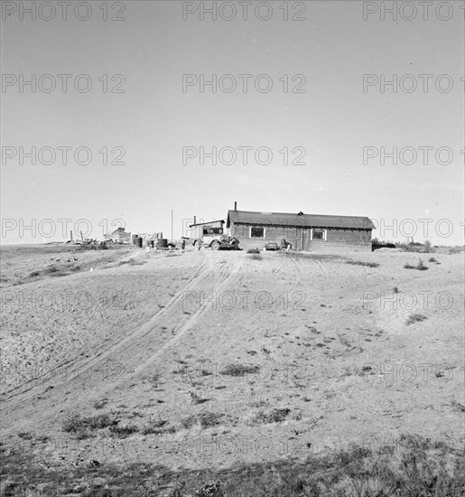 The Browning home, a partial dugout, Dead Ox Flat, Malheur County, Oregon, 1939. Creator: Dorothea Lange.