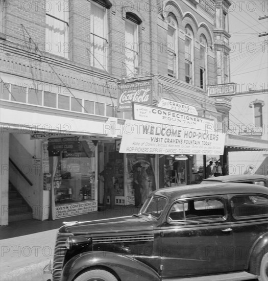 Street corner, Williamette Valley. Small town during hop season. Independence, Polk County, Oregon.