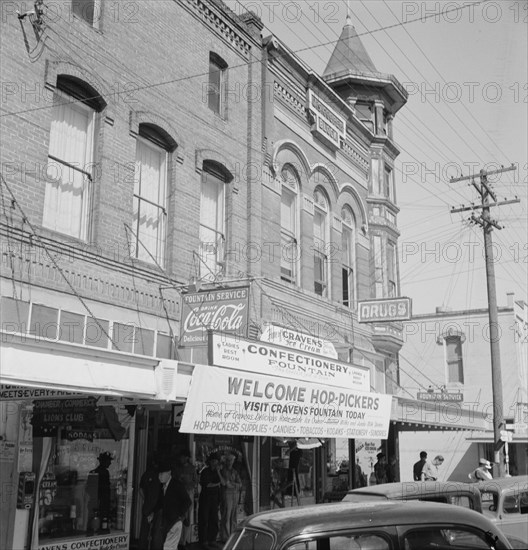 Street corner, Williamette Valley. Small town during hop season. Independence, Polk County, Oregon.