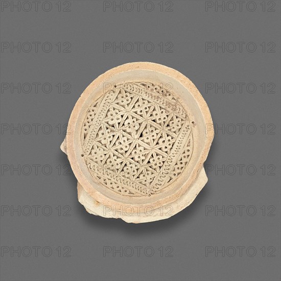 Clay Filter with punched and inscribed decoration, Fatimid dynasty (969-1171), 11th-12th century.