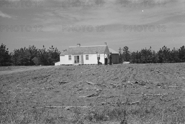 [Untitled photo, possibly related to: Carpenter at work, Eatonton, Georgia. Briar Patch Project].