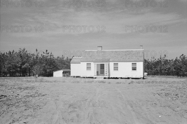 [Untitled photo, possibly related to: Carpenter at work, Eatonton, Georgia. Briar Patch Project].