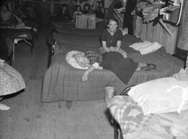 Flood refugees in canning factory used by the Red Cross as a relief station. Mayfield, Kentucky.