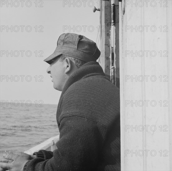 On board the fishing boat Alden out of Gloucester, Massachusetts. Pasquale Maniscaleo, engineer.