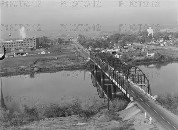 Sugar beet factory along Snake River. Shows beet dump, beet pile. Nyssa, Malheur County, Oregon.