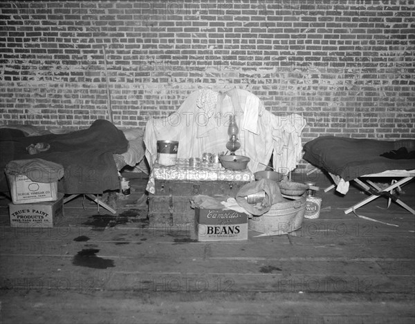 Household goods of a Negro flood refugee in the temporary infirmary. Forrest City, Arkansas.