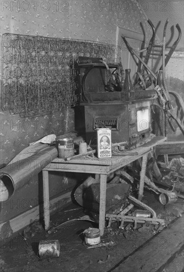 Interior of a farmhouse near Ridgeley, Tennessee, after the 1937 flood waters had subsided.