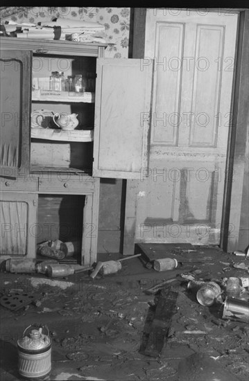 Interior of a farmhouse near Ridgeley, Tennessee, after the 1937 flood waters had subsided.