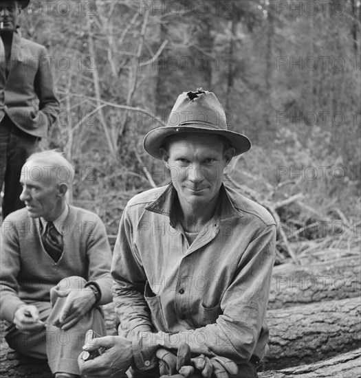 Member of the co-op in the woods. Ola self help cooperative sawmill. Gem County, Idaho.