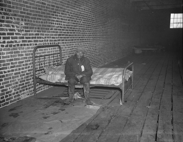 Negro flood refugee in the Red Cross temporary infirmary of Forrest City, Arkansas.