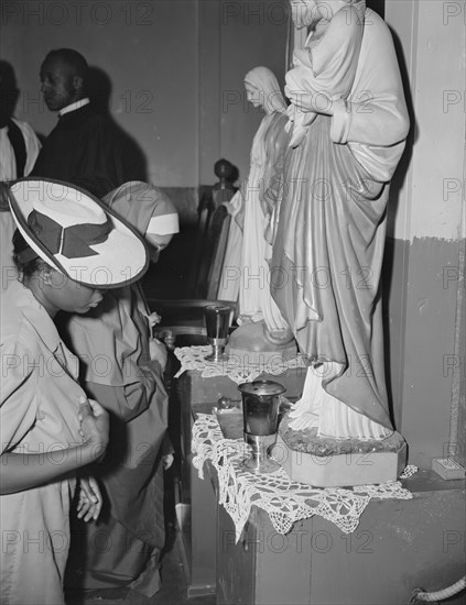 Washington, D.C. Worshippers before the altar in the St. Martin's Spiritual Church.