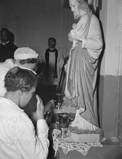 Washington, D.C. Worshippers before the altar in the St. Martin's Spiritual Church.