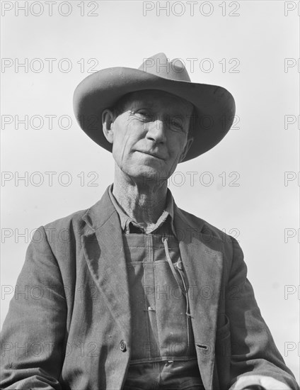 Farmer from Nebraska now developing eighty-acre stump farm. Bonner County, Idaho.