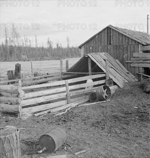 Farm buildings, slab construction, on new stump farm. Boundary County, Idaho.