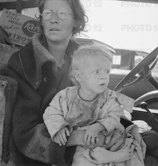 Mother and baby of family on the road. Tulelake, Siskiyou County, California.