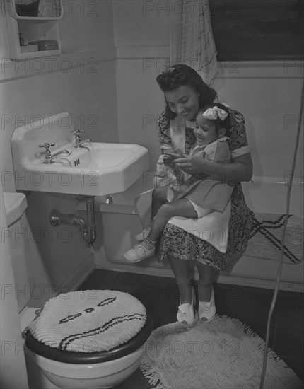 Anacostia, D.C. Frederick Douglass housing project. Mother and her daughter.