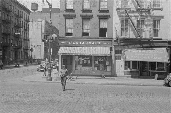 New York, New York. 61st Street between 1st and 3rd Avenues. A street scene.