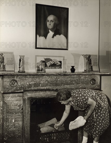 Washington, D.C. Government charwoman cleaning after regular working hours.