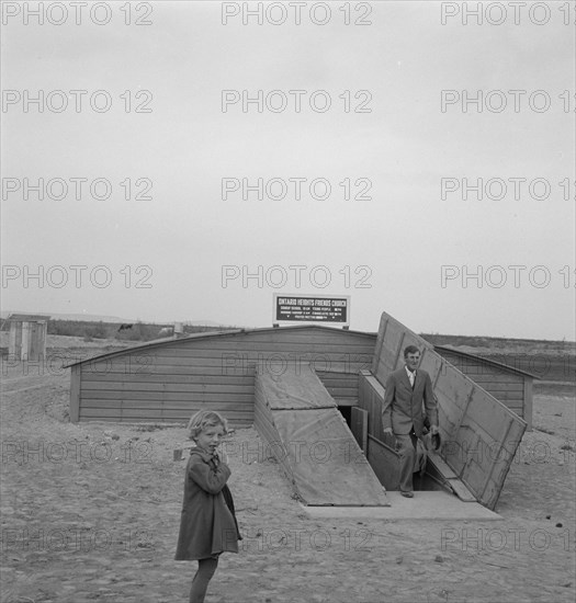 Congregation leaving after services. Dead Ox Flat, Malheur County, Oregon.