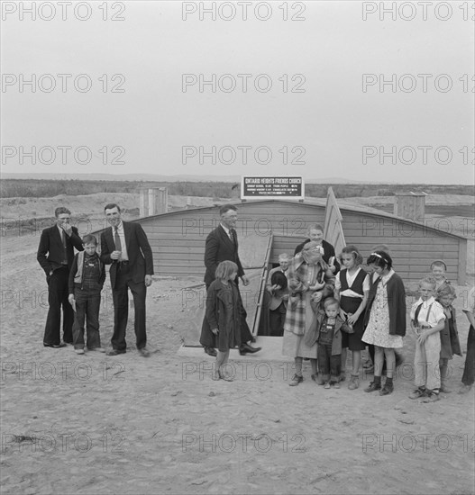 Congregation leaving after services. Dead Ox Flat, Malheur County, Oregon.