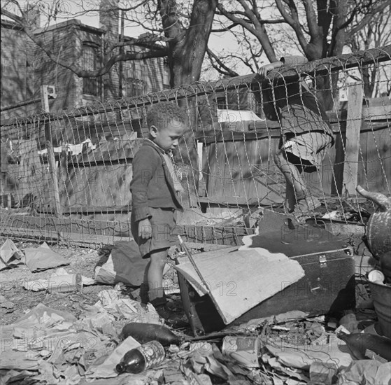 Washington (southwest section), D.C. Two boys playing in their backyard.