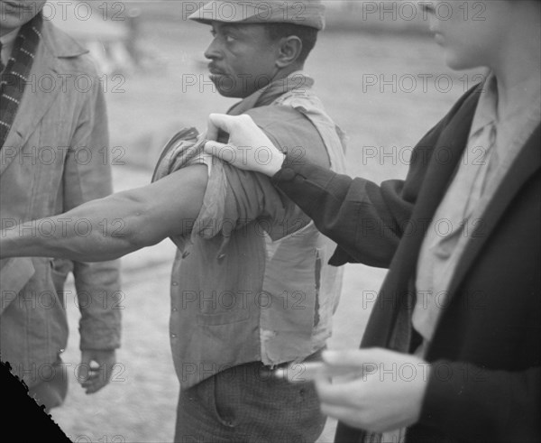 Vaccination in the camp for Negro flood refugees at Marianna, Arkansas.